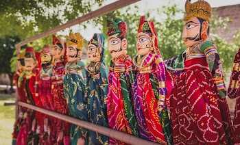 Male and Female Dolls With Colorful Costumes