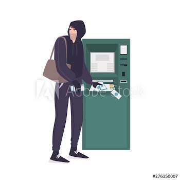 Male thief stealing money banknotes from ATM
