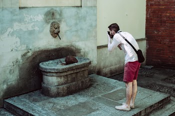 Male tourist taking a picture