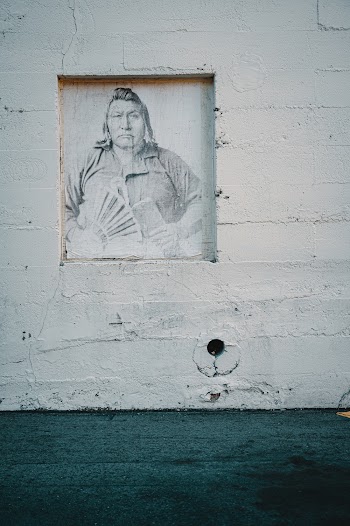 Man's Face Painted on Wall