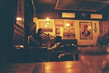 Man's Portrait Painting on Wall
