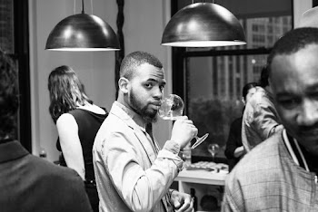Man About to Drink from Wine Glass Indoors