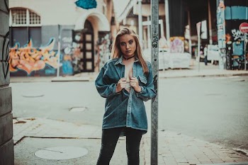 man about to open jacket