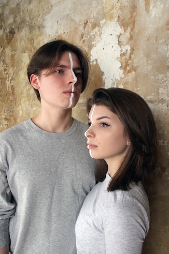 Man And Wearing Grey Crew Neck Long Sleeved Shirts