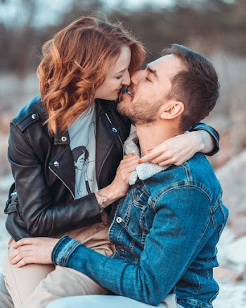 Man And Woman About To Kiss