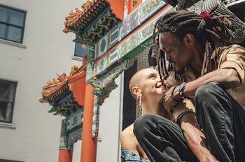 Man and Woman About to Kiss Each Other