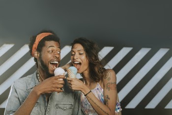 Man and Woman Eating Ice Creams