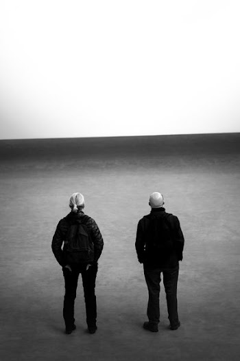 man and woman facing backward photography