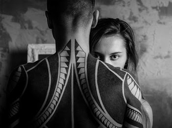 man and woman facing each other