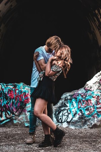 man and woman facing each other