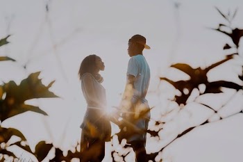 man and woman facing each other