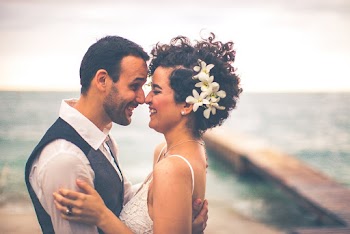 Man and Woman Holding Each Other Smiling