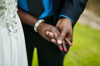 Man and Woman Holding Hands