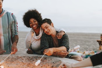 Man and Woman Holding Stick