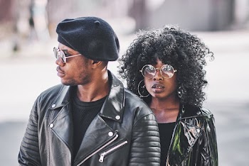 Man and Woman in Black Leather Jackets