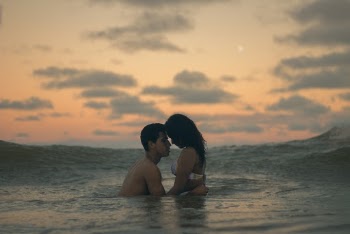 Man and Woman in the Middle of Ocean