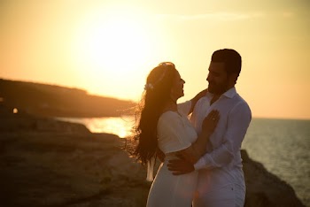 Man And Woman In White Clothing