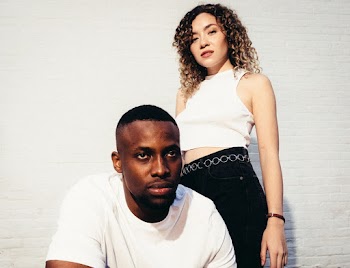 Man And Woman In White Top