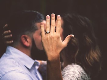 man and woman kissing