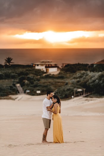 Man and Woman Kissing at a Beach