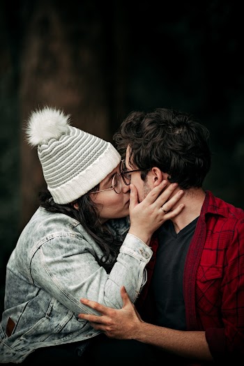 Man and Woman Kissing Each Other
