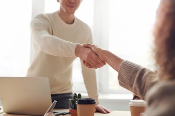 Man and Woman Near Table · Free Stock Photo