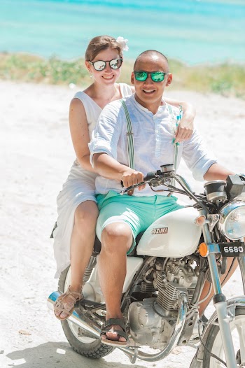 Man and Woman Riding Motorcycle