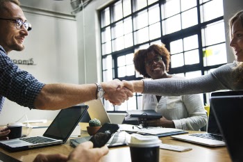 Man and Woman Shaking Hands