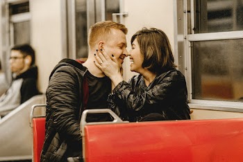 Man and Woman Sitting Inside Vehicle