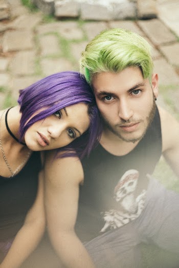 Man and Woman Sitting on Floor Outdoor