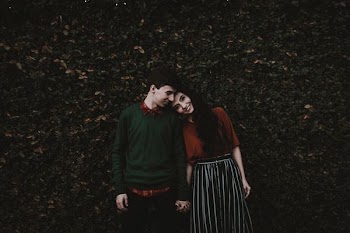man and woman smiling each other
