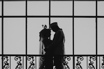 Man and Woman Standing and Facing Each Other