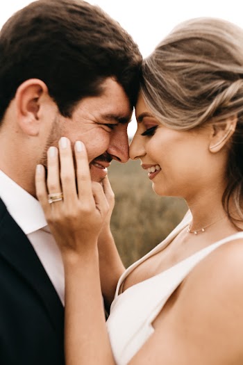 Man and Woman Standing Facing Each Other