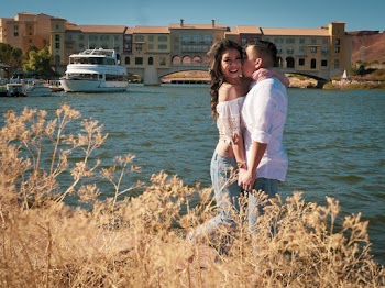 Man and Woman Standing Near Body of Water