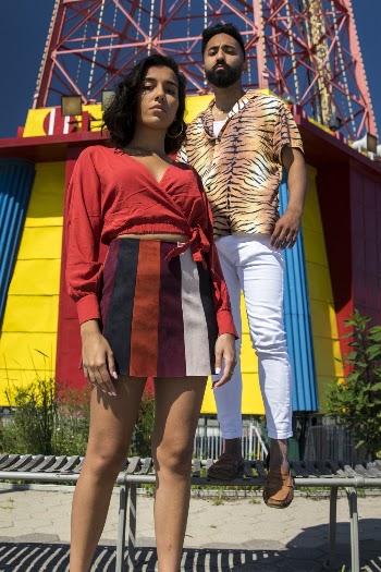 Man and Woman Standing Near Tower