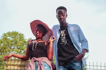 Man and Woman Standing Near Wall