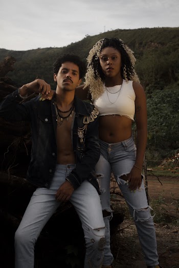Man and Woman Standing Next to Each Other