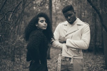 Man and Woman Standing on Forest