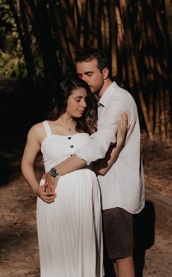 Man and Woman Standing Outdoors