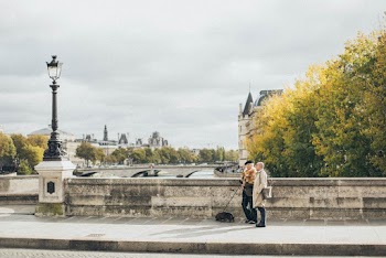 Man and Woman Walking Near Road