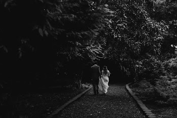man and woman walking on street
