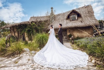 Man and Woman Wearing Wedding Outfits