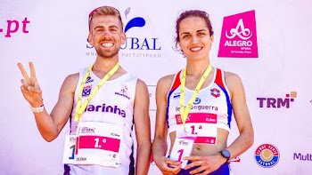 Man and Woman Winning A Race