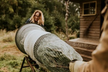 Man and woman wrapping a Christmas | Free Photo - rawpixel