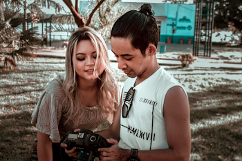 Man and Womn Looking at Camera