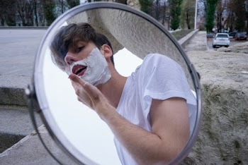 Man Applying Shaving Cream on His Face