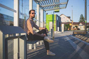 Man at tram stop