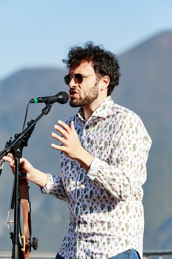 Man Behind Black Microphone 