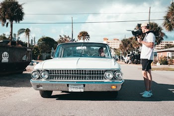Man Beside Car