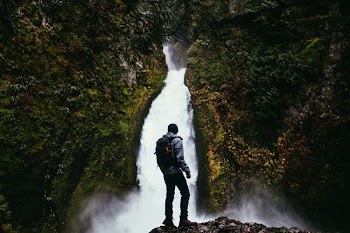 man beside falls